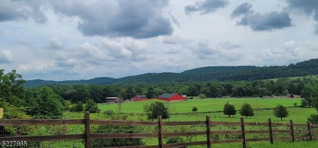 view of mountain feature with a rural view