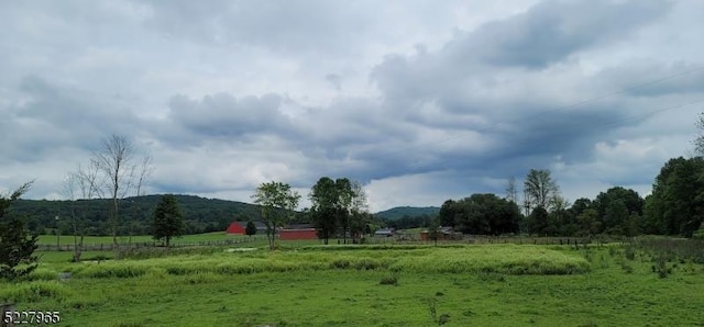 exterior space featuring a mountain view and a rural view