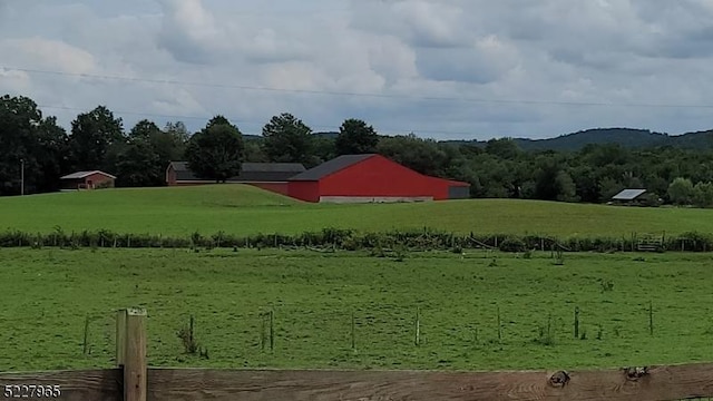 view of community with a rural view