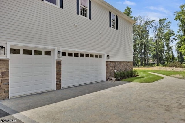 view of property exterior featuring a garage