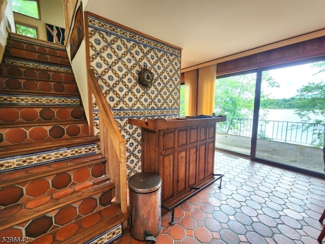 staircase with tile flooring