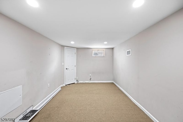 finished basement featuring carpet floors, recessed lighting, and baseboards
