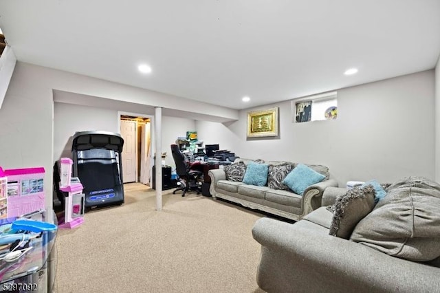 living area featuring carpet floors and recessed lighting