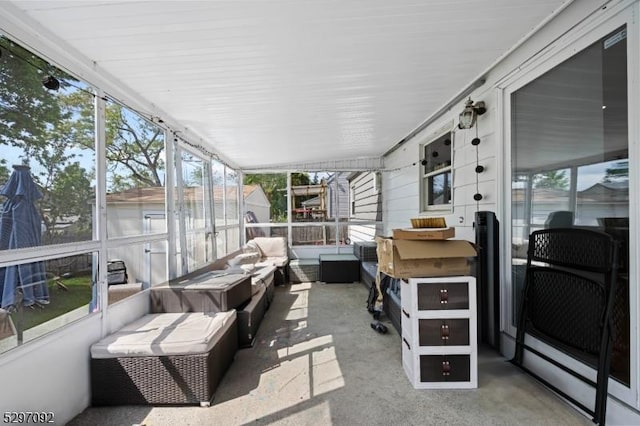 sunroom / solarium featuring an outdoor living space