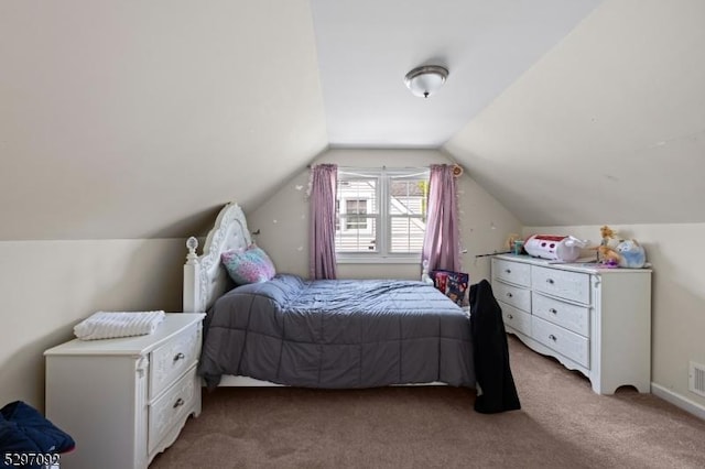 bedroom featuring light carpet and lofted ceiling