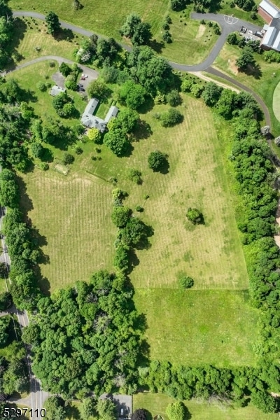 birds eye view of property featuring a rural view