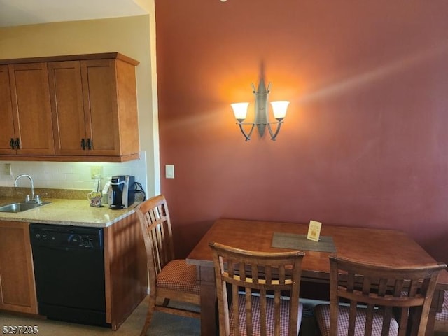 dining area with an inviting chandelier and sink