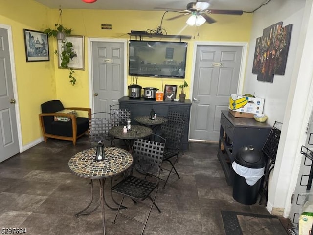 interior space featuring ceiling fan