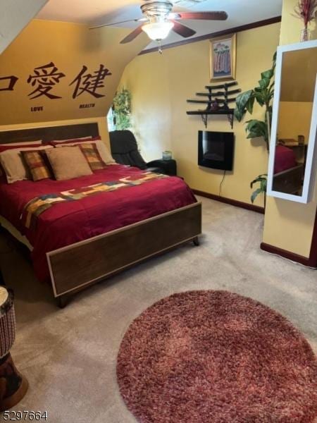 bedroom featuring ornamental molding, carpet floors, and ceiling fan