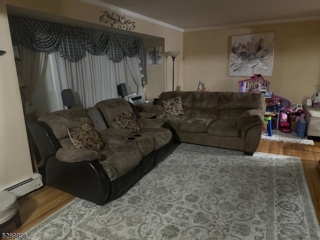 living room featuring a baseboard heating unit, crown molding, and hardwood / wood-style flooring