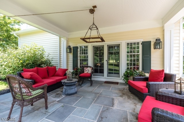 view of patio / terrace with an outdoor hangout area and french doors