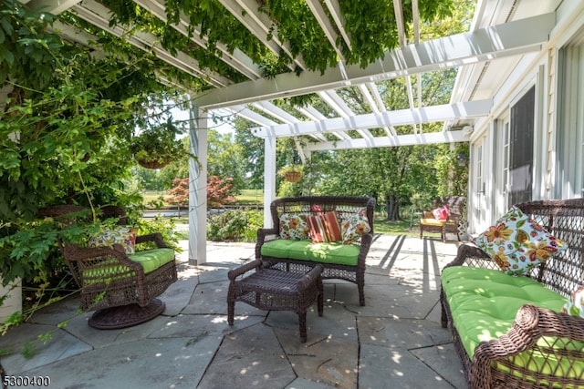 view of patio / terrace with a pergola and an outdoor living space