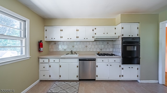 kitchen with decorative backsplash, dishwasher, black double oven, and plenty of natural light