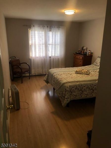 bedroom featuring hardwood / wood-style floors