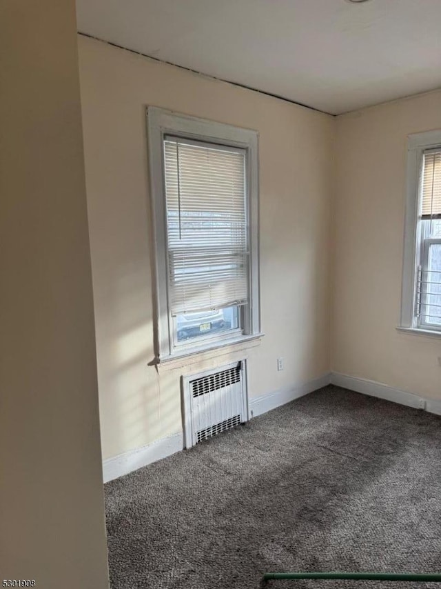 70 Campfield St, Irvington Twp, NJ 07111 - unfurnished room with baseboards, carpet floors, and radiator