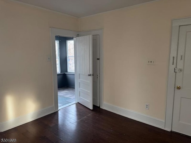 70 Campfield St, Irvington Twp, NJ 07111 - unfurnished room featuring dark wood-style flooring and baseboards