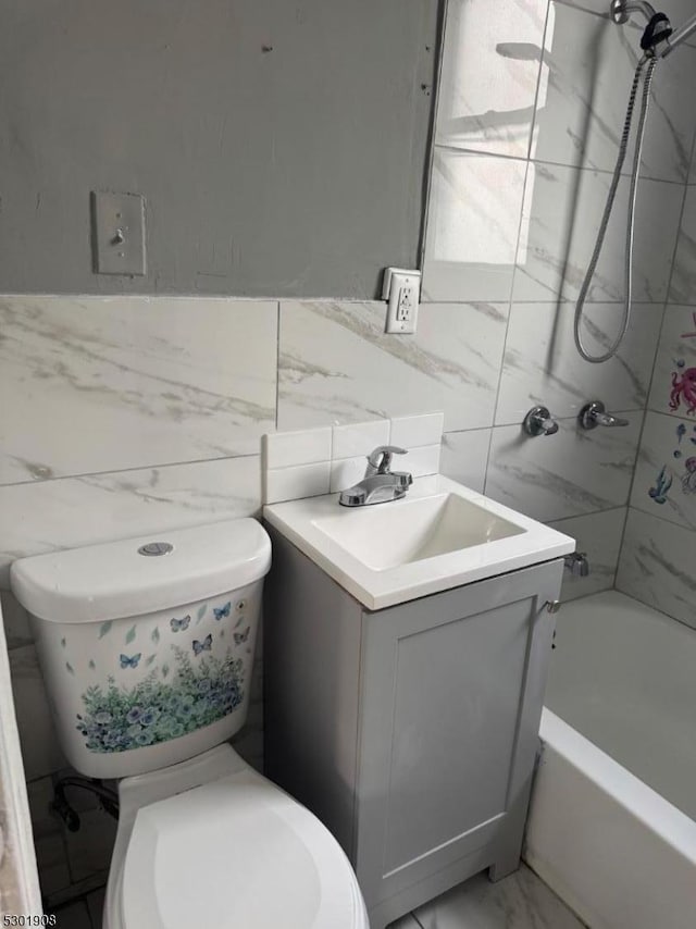 70 Campfield St, Irvington Twp, NJ 07111 - full bath with tile walls, tub / shower combination, marble finish floor, toilet, and vanity