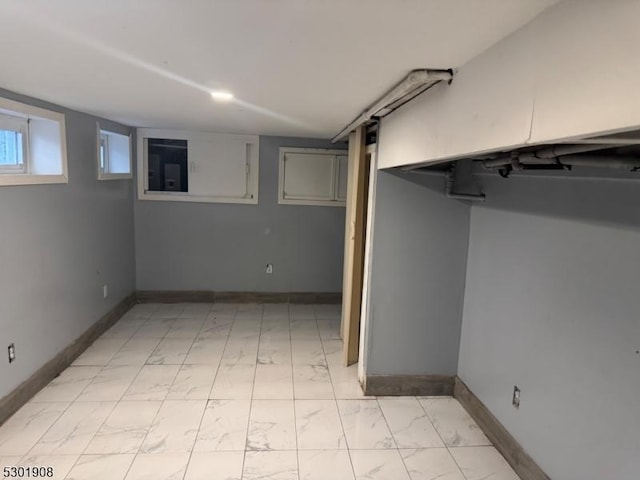 70 Campfield St, Irvington Twp, NJ 07111 - below grade area with baseboards and marble finish floor