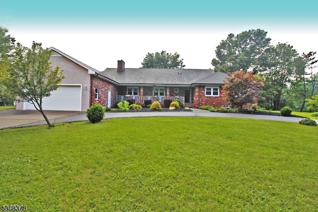 ranch-style house with a front yard and a garage