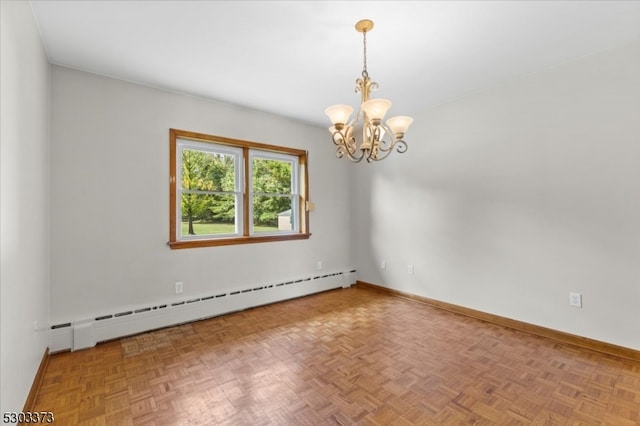 unfurnished room with parquet floors, a chandelier, and a baseboard radiator