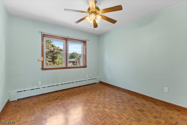 unfurnished room featuring light parquet floors, ceiling fan, and a baseboard heating unit