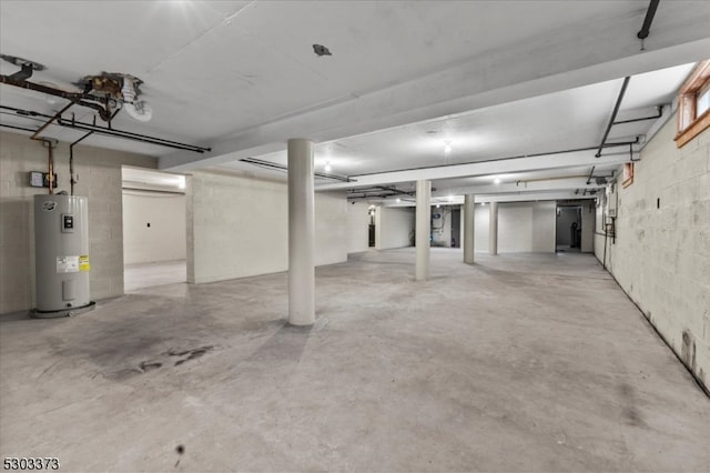 garage featuring electric water heater