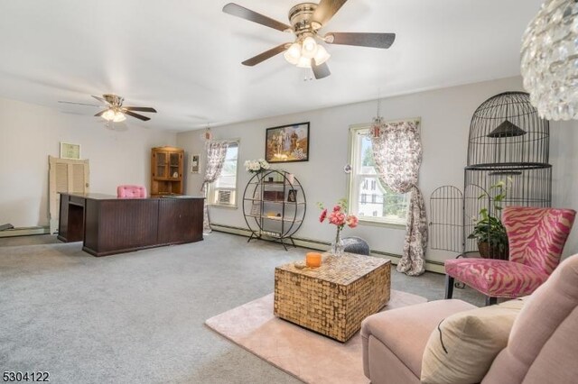 carpeted living room featuring ceiling fan with notable chandelier and a baseboard heating unit