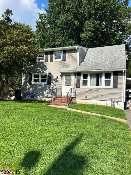 view of front of home with a front yard