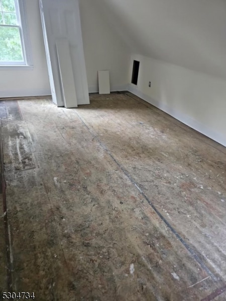 bonus room with lofted ceiling