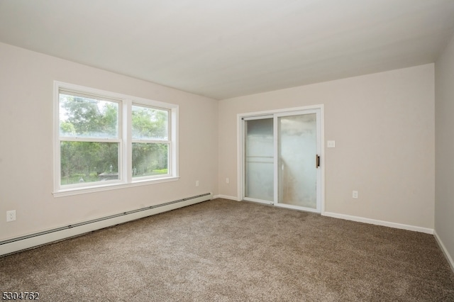 unfurnished bedroom with a closet, a baseboard radiator, and carpet flooring