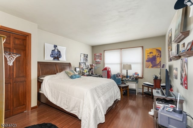 bedroom featuring dark hardwood / wood-style floors