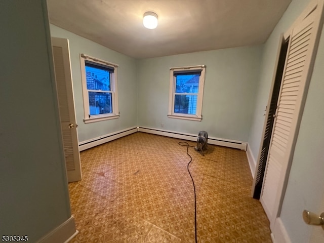 unfurnished room featuring light tile patterned floors