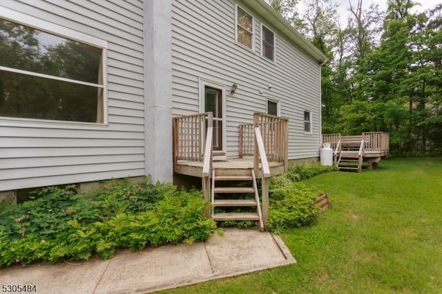 47 Sarepta Rd, White Twp, NJ 07823 - back of house featuring a wooden deck and a lawn