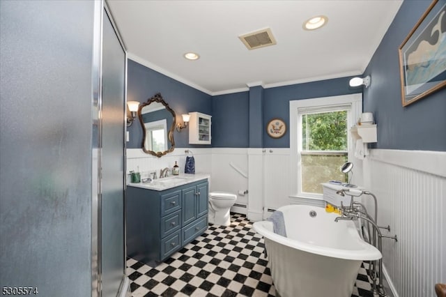 bathroom with backsplash, toilet, tile patterned flooring, vanity, and a washtub