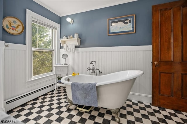 bathroom with tile patterned floors, ornamental molding, a tub, and a baseboard radiator