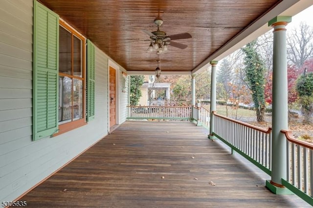 deck featuring ceiling fan and a porch