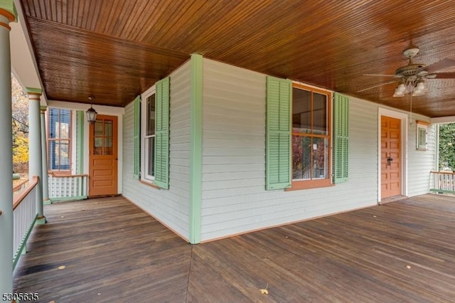 wooden deck featuring ceiling fan and covered porch