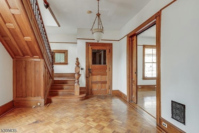 foyer featuring light parquet floors