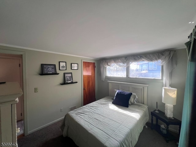 carpeted bedroom with ornamental molding