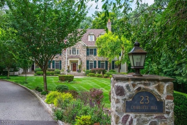 view of front of house with a front yard