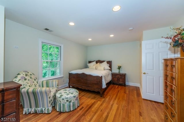 bedroom with light wood-type flooring