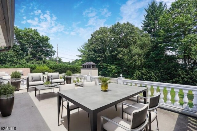 view of patio with an outdoor living space