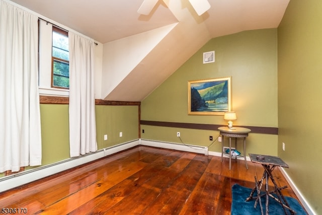 bonus room with ceiling fan, vaulted ceiling, and wood-type flooring