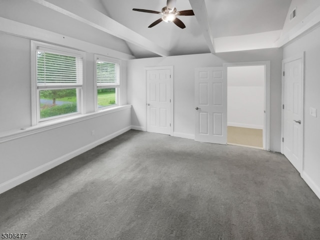 unfurnished bedroom with ceiling fan, carpet floors, and vaulted ceiling