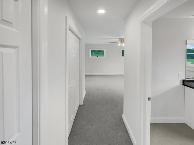 corridor with carpet floors