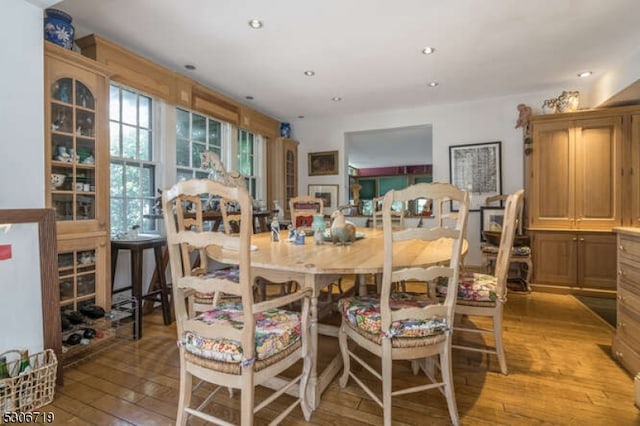 dining area featuring light wood-type flooring