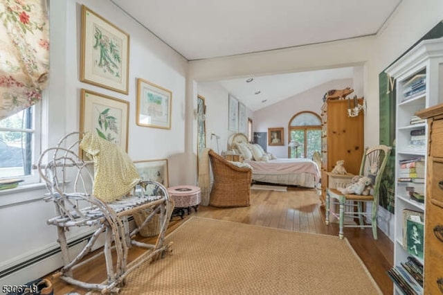 bedroom with multiple windows, light wood-type flooring, vaulted ceiling, and baseboard heating