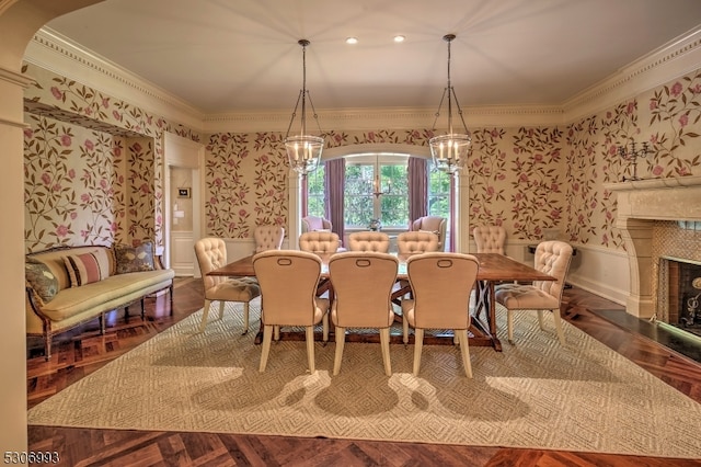 dining space featuring a notable chandelier and crown molding