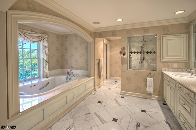 bathroom featuring ornamental molding, vanity, and shower with separate bathtub