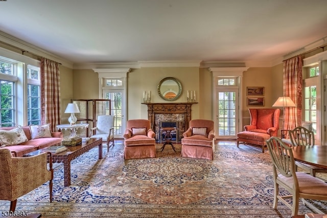 living room featuring a fireplace and ornamental molding